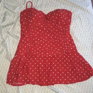 One piece skirted swimsuit with built in bra